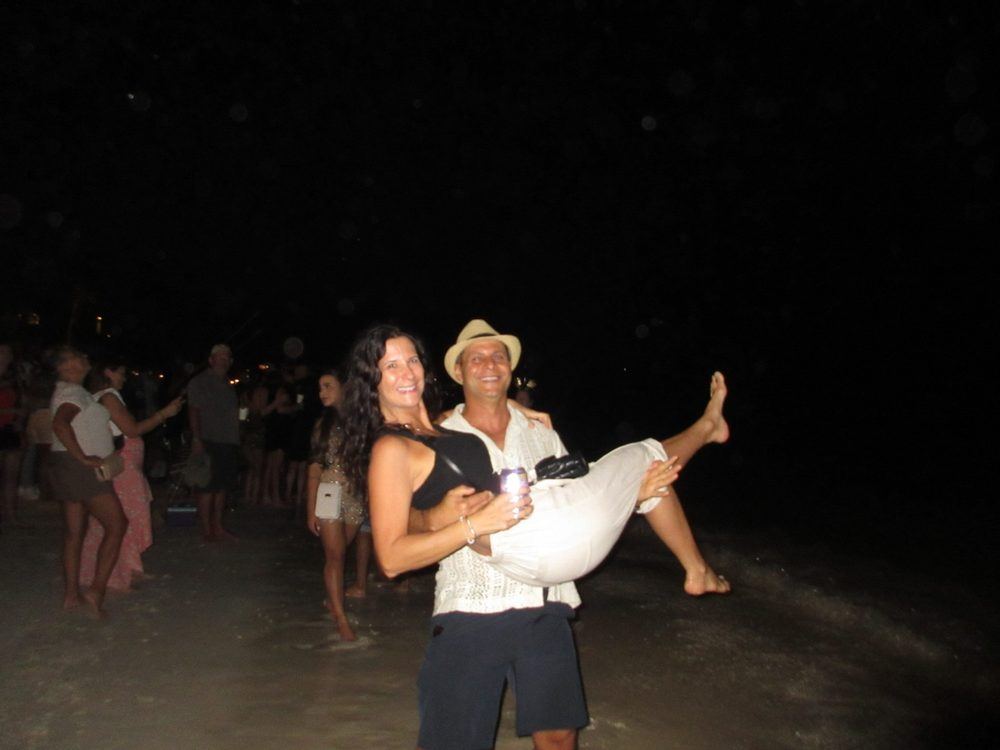Rob carrying Nadine on Palm Beach on New Year’s Eve