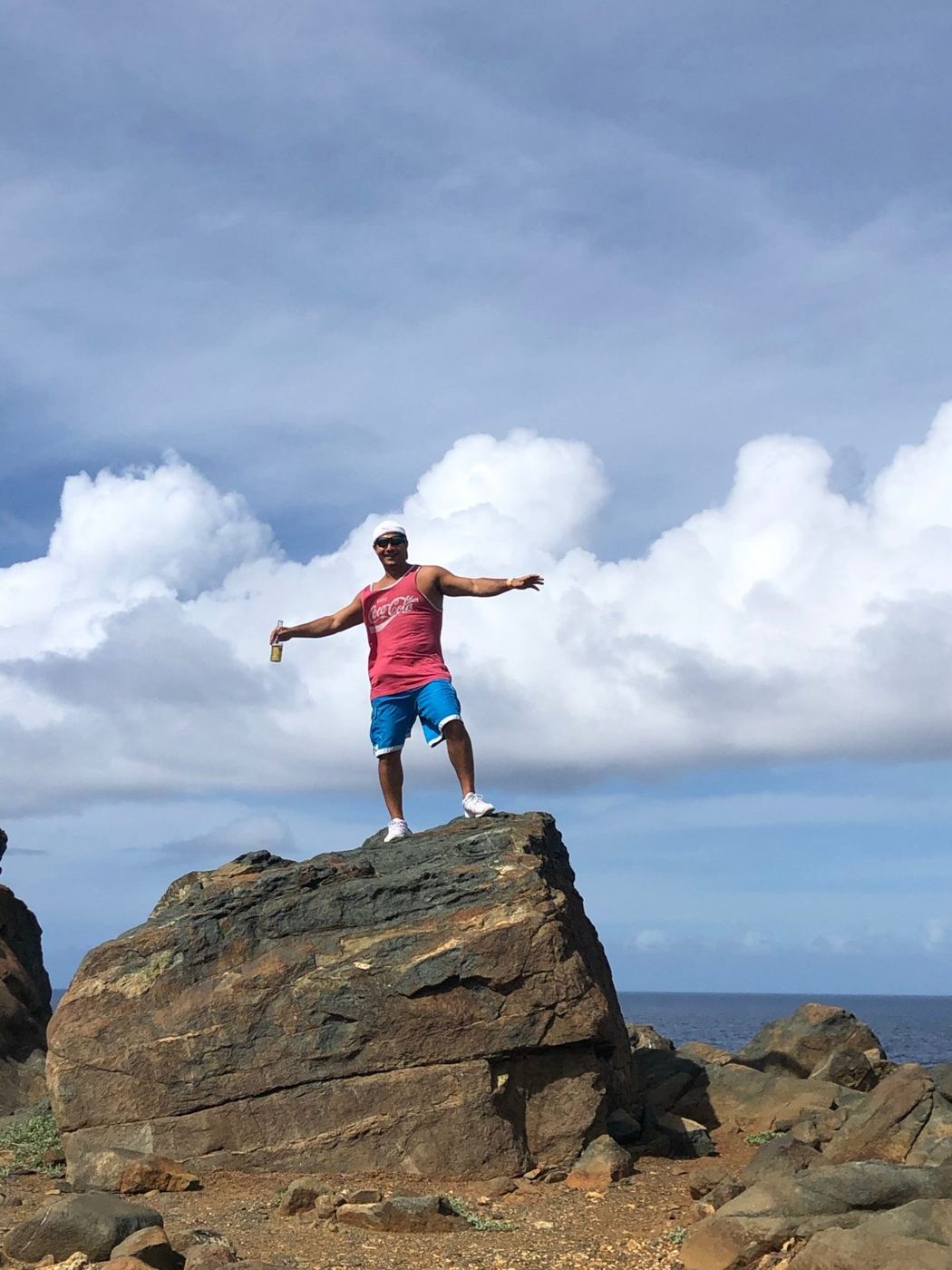 Rob standing on a big rock on Aruba's north coast
